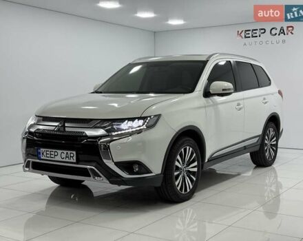 Белый Мицубиси Аутлендер, объемом двигателя 2.36 л и пробегом 112 тыс. км за 21900 $, фото 5 на Automoto.ua
