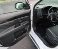 Білий Міцубісі Аутлендер, об'ємом двигуна 2 л та пробігом 30 тис. км за 7500 $, фото 16 на Automoto.ua
