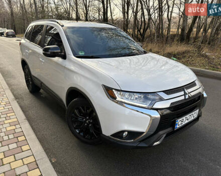 Білий Міцубісі Аутлендер, об'ємом двигуна 2.4 л та пробігом 130 тис. км за 15700 $, фото 1 на Automoto.ua