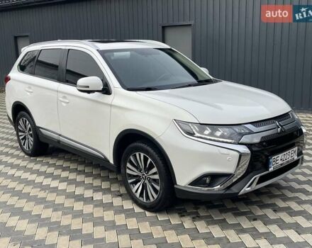 Белый Мицубиси Аутлендер, объемом двигателя 2.36 л и пробегом 112 тыс. км за 21500 $, фото 4 на Automoto.ua