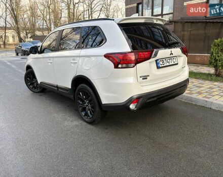 Білий Міцубісі Аутлендер, об'ємом двигуна 2.4 л та пробігом 130 тис. км за 15700 $, фото 5 на Automoto.ua