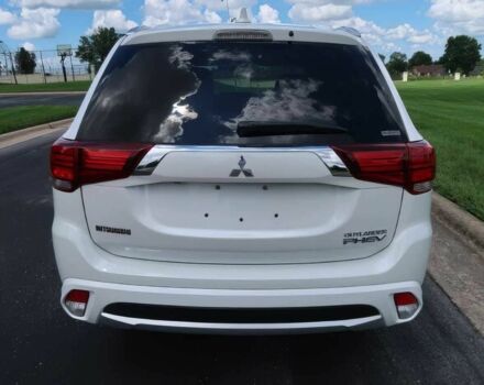 Белый Мицубиси Аутлендер, объемом двигателя 2 л и пробегом 50 тыс. км за 11699 $, фото 5 на Automoto.ua