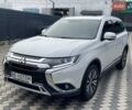 Белый Мицубиси Аутлендер, объемом двигателя 2.36 л и пробегом 112 тыс. км за 21500 $, фото 2 на Automoto.ua