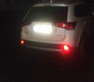 Білий Міцубісі Аутлендер, об'ємом двигуна 2.36 л та пробігом 50 тис. км за 27000 $, фото 4 на Automoto.ua