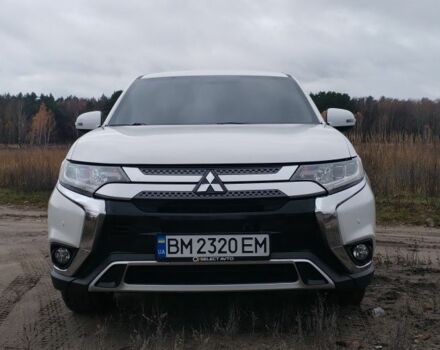 Белый Мицубиси Аутлендер, объемом двигателя 2.4 л и пробегом 122 тыс. км за 17400 $, фото 1 на Automoto.ua