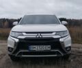 Белый Мицубиси Аутлендер, объемом двигателя 2.4 л и пробегом 122 тыс. км за 17400 $, фото 1 на Automoto.ua