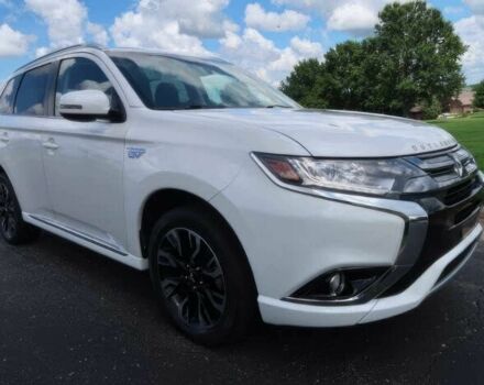 Белый Мицубиси Аутлендер, объемом двигателя 2 л и пробегом 31 тыс. км за 10000 $, фото 2 на Automoto.ua