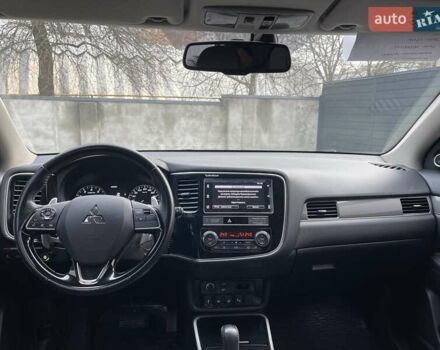 Белый Мицубиси Аутлендер, объемом двигателя 2.36 л и пробегом 112 тыс. км за 21500 $, фото 14 на Automoto.ua