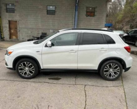 Белый Мицубиси Аутлендер, объемом двигателя 2.4 л и пробегом 67 тыс. км за 7000 $, фото 5 на Automoto.ua