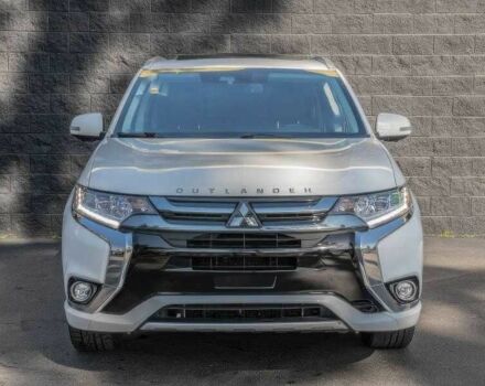 Белый Мицубиси Аутлендер, объемом двигателя 2 л и пробегом 89 тыс. км за 8500 $, фото 1 на Automoto.ua