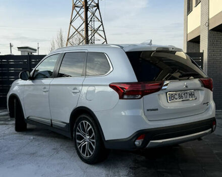 Белый Мицубиси Аутлендер, объемом двигателя 2.4 л и пробегом 91 тыс. км за 19199 $, фото 1 на Automoto.ua