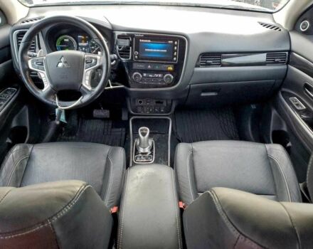 Белый Мицубиси Аутлендер, объемом двигателя 2 л и пробегом 73 тыс. км за 4000 $, фото 7 на Automoto.ua