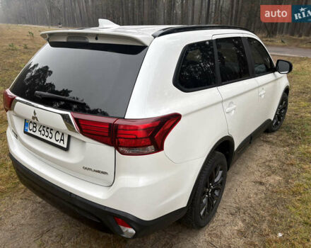 Білий Міцубісі Аутлендер, об'ємом двигуна 2.4 л та пробігом 130 тис. км за 16200 $, фото 3 на Automoto.ua