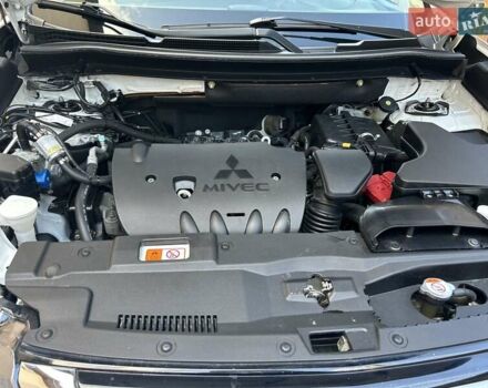 Белый Мицубиси Аутлендер, объемом двигателя 2 л и пробегом 56 тыс. км за 19400 $, фото 87 на Automoto.ua