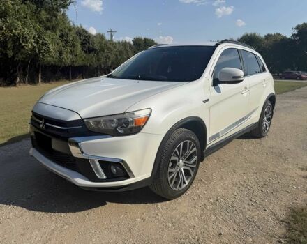 Белый Мицубиси Аутлендер, объемом двигателя 2.4 л и пробегом 45 тыс. км за 5400 $, фото 2 на Automoto.ua