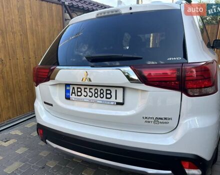 Белый Мицубиси Аутлендер, объемом двигателя 2 л и пробегом 56 тыс. км за 19400 $, фото 11 на Automoto.ua