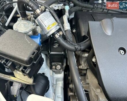 Белый Мицубиси Аутлендер, объемом двигателя 2 л и пробегом 56 тыс. км за 19400 $, фото 65 на Automoto.ua