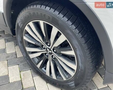 Белый Мицубиси Аутлендер, объемом двигателя 2.36 л и пробегом 112 тыс. км за 21500 $, фото 10 на Automoto.ua