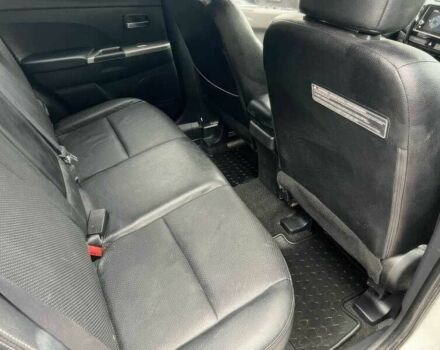 Белый Мицубиси Аутлендер, объемом двигателя 2.4 л и пробегом 67 тыс. км за 7000 $, фото 8 на Automoto.ua