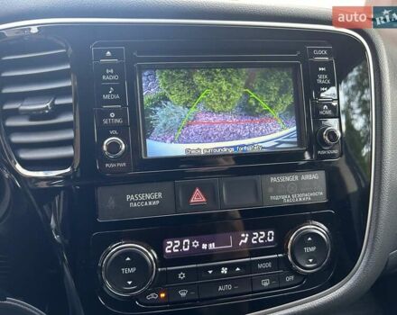 Белый Мицубиси Аутлендер, объемом двигателя 2 л и пробегом 56 тыс. км за 19400 $, фото 24 на Automoto.ua