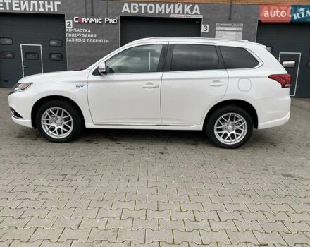 Білий Міцубісі Аутлендер, об'ємом двигуна 2 л та пробігом 118 тис. км за 17800 $, фото 7 на Automoto.ua