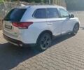 Белый Мицубиси Аутлендер, объемом двигателя 3 л и пробегом 127 тыс. км за 15300 $, фото 2 на Automoto.ua