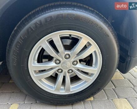 Белый Мицубиси Аутлендер, объемом двигателя 2 л и пробегом 56 тыс. км за 19400 $, фото 68 на Automoto.ua