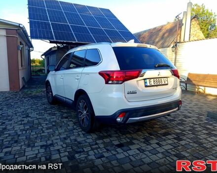 Белый Мицубиси Аутлендер, объемом двигателя 2.4 л и пробегом 87 тыс. км за 16800 $, фото 4 на Automoto.ua