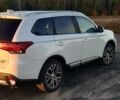 Белый Мицубиси Аутлендер, объемом двигателя 2.36 л и пробегом 57 тыс. км за 17200 $, фото 2 на Automoto.ua
