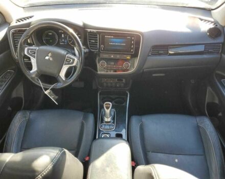 Белый Мицубиси Аутлендер, объемом двигателя 2 л и пробегом 129 тыс. км за 5100 $, фото 7 на Automoto.ua