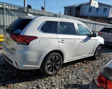 Белый Мицубиси Аутлендер, объемом двигателя 2 л и пробегом 129 тыс. км за 5100 $, фото 2 на Automoto.ua