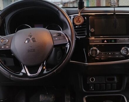 Белый Мицубиси Аутлендер, объемом двигателя 2.4 л и пробегом 122 тыс. км за 17400 $, фото 19 на Automoto.ua