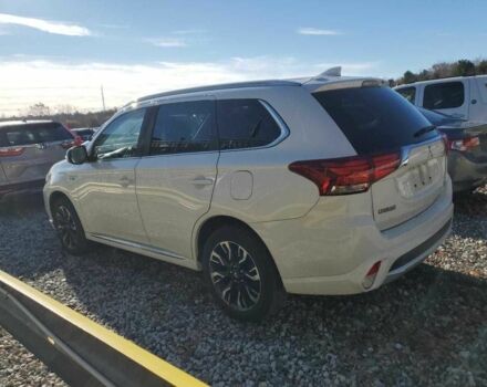 Белый Мицубиси Аутлендер, объемом двигателя 2 л и пробегом 129 тыс. км за 5100 $, фото 1 на Automoto.ua