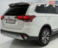 Белый Мицубиси Аутлендер, объемом двигателя 2.36 л и пробегом 112 тыс. км за 21900 $, фото 16 на Automoto.ua