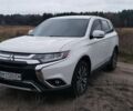 Белый Мицубиси Аутлендер, объемом двигателя 2.4 л и пробегом 122 тыс. км за 17400 $, фото 1 на Automoto.ua