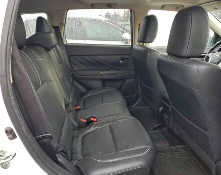 Белый Мицубиси Аутлендер, объемом двигателя 2 л и пробегом 73 тыс. км за 4000 $, фото 10 на Automoto.ua