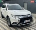 Белый Мицубиси Аутлендер, объемом двигателя 2.36 л и пробегом 112 тыс. км за 21500 $, фото 1 на Automoto.ua