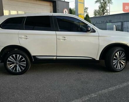 Білий Міцубісі Аутлендер, об'ємом двигуна 2.4 л та пробігом 98 тис. км за 19600 $, фото 1 на Automoto.ua