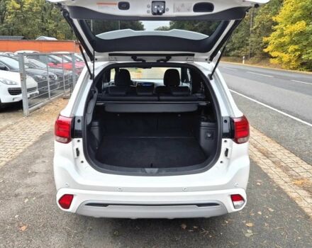 Белый Мицубиси Аутлендер, объемом двигателя 2.4 л и пробегом 42 тыс. км за 6000 $, фото 6 на Automoto.ua