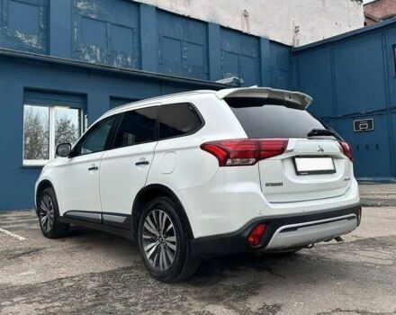 Белый Мицубиси Аутлендер, объемом двигателя 2.4 л и пробегом 96 тыс. км за 10800 $, фото 5 на Automoto.ua