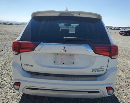 Белый Мицубиси Аутлендер, объемом двигателя 2 л и пробегом 54 тыс. км за 4200 $, фото 5 на Automoto.ua