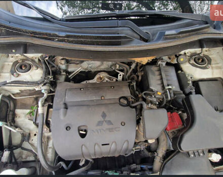 Белый Мицубиси Аутлендер, объемом двигателя 2 л и пробегом 19 тыс. км за 18500 $, фото 12 на Automoto.ua