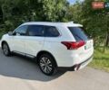 Белый Мицубиси Аутлендер, объемом двигателя 2.36 л и пробегом 160 тыс. км за 17400 $, фото 7 на Automoto.ua