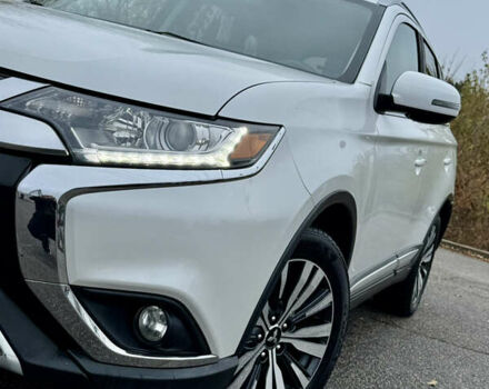 Білий Міцубісі Аутлендер, об'ємом двигуна 2.4 л та пробігом 190 тис. км за 14500 $, фото 6 на Automoto.ua