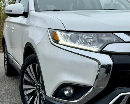 Білий Міцубісі Аутлендер, об'ємом двигуна 2.4 л та пробігом 190 тис. км за 14500 $, фото 7 на Automoto.ua