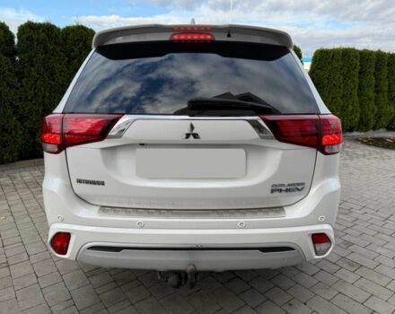 Білий Міцубісі Аутлендер, об'ємом двигуна 2 л та пробігом 31 тис. км за 13000 $, фото 3 на Automoto.ua