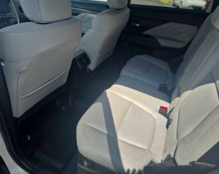 Белый Мицубиси Аутлендер, объемом двигателя 2 л и пробегом 49 тыс. км за 12400 $, фото 11 на Automoto.ua