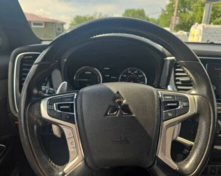 Белый Мицубиси Аутлендер, объемом двигателя 2 л и пробегом 49 тыс. км за 12400 $, фото 7 на Automoto.ua