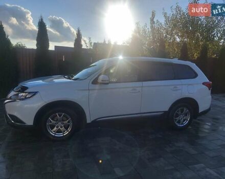 Белый Мицубиси Аутлендер, объемом двигателя 2 л и пробегом 108 тыс. км за 19000 $, фото 2 на Automoto.ua