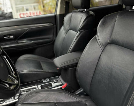 Білий Міцубісі Аутлендер, об'ємом двигуна 2.4 л та пробігом 190 тис. км за 14500 $, фото 19 на Automoto.ua